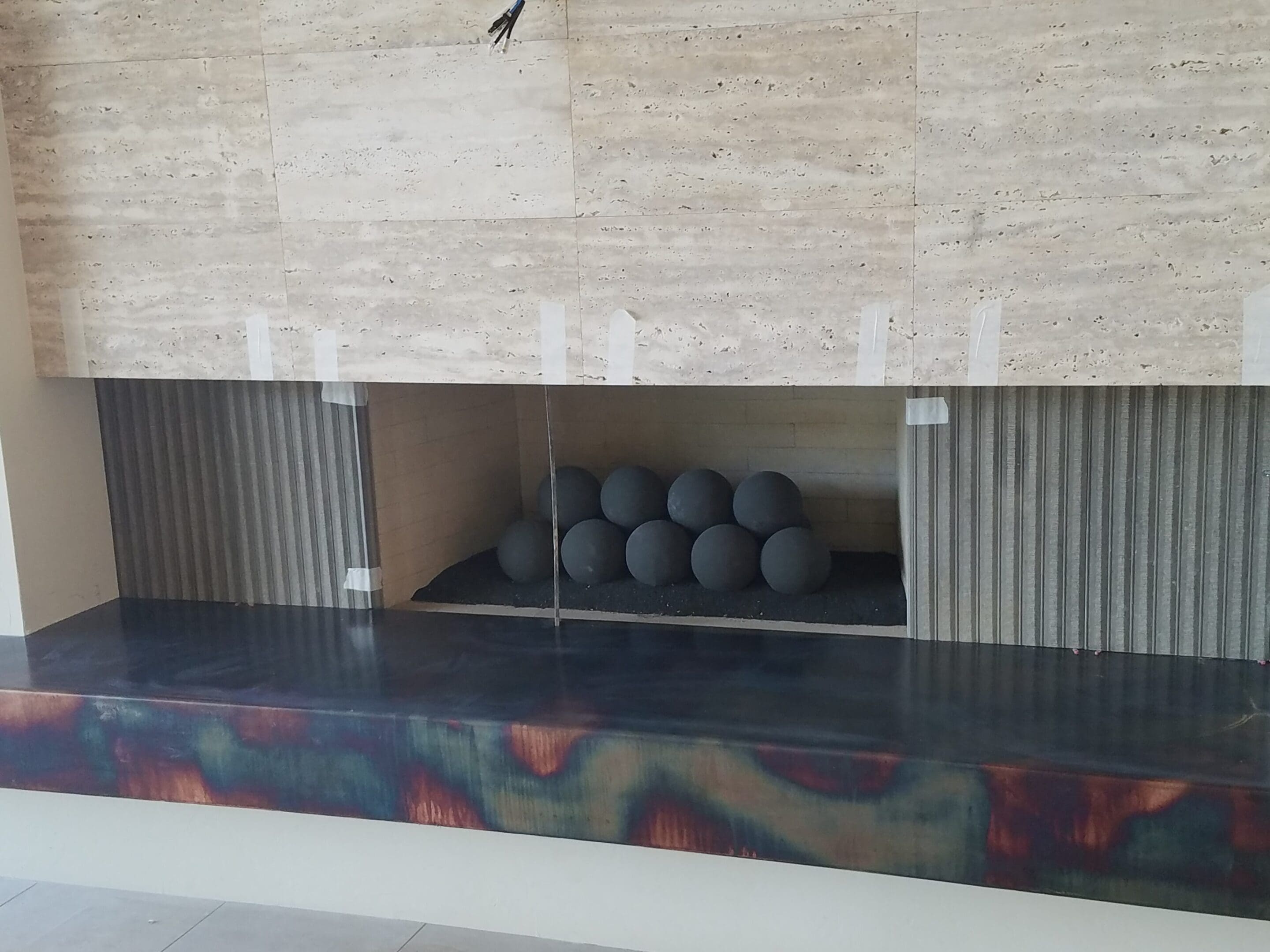A fireplace with some balls in it